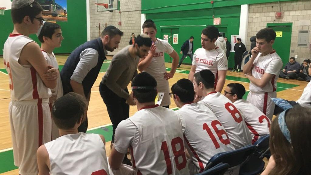 Basketball team huddle during a game